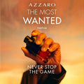 Azzaro The Most Wanted Parfum bottle held in hand, showcasing its bold fragrance and luxury appeal.